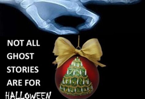 Graphic of a skeletal hand holding a Christmas ornament. Text reads Not All Ghost Stories Are For Halloween. A Christmas Carol.