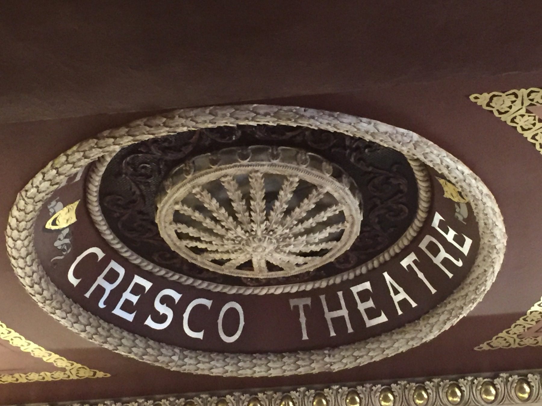 From the ceiling of the Opera House, Cresco Theatre in gold leafing